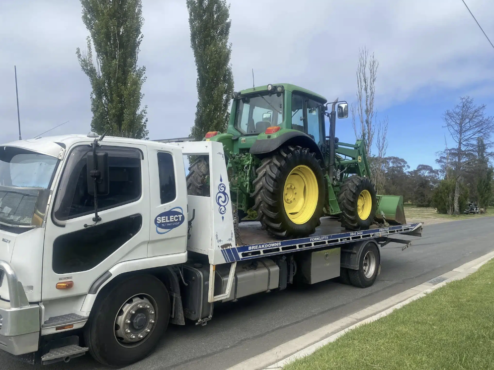 A tractor being towed